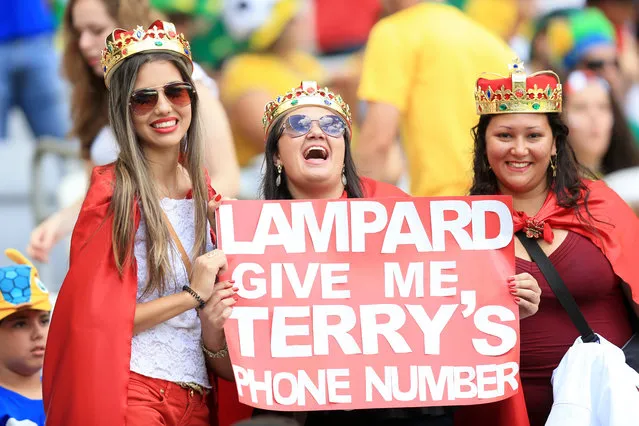 Fans with a comical sign in the stands before the FIFA World Cup, Group D match at the Estadio Mineirao, Belo Horizonte, Brazil, on June 24, 2014. (Photo by Mike Egerton/PA Wire)