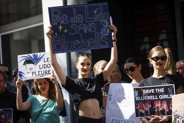 Lido cabaret employees demonstrate to try to save their jobs and the history of the cabaret, known for its dinner theater and its “Bluebell Girls” revue, Saturday, May 28, 2022 in Paris. (Photo by Thomas Padilla/AP Photo)