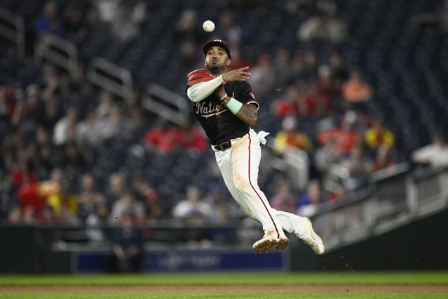 Washington Nationals shortstop Nasim Nunez throws to first to put out Kansas City Royals' Maikel Garcia during the ninth inning of a baseball game, Wednesday, September 25, 2024, in Washington. The Royals won 3-0. (Photo by Nick Wass/AP Photo)