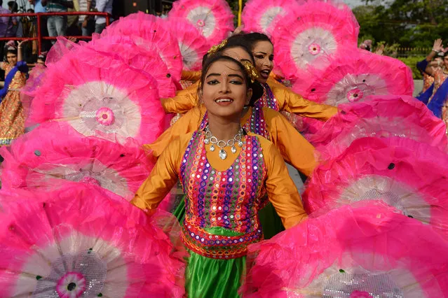 School students perform during a full dress rehearsal for the upcoming Indian Republic Day parade, in Chennai on January 23, 2020. India will be celebrating its 71st Republic Day on January 26. (Photo by Arun Sankar/AFP Photo)