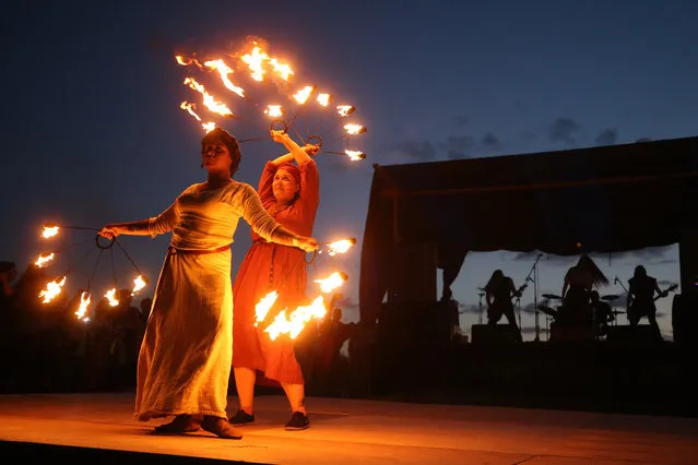 A fire show at the 2017 Great Bolgar Medieval Fighting festival in Tatarstan, Russia on August 12, 2017. (Photo by Yegor Aleyev/TASS)