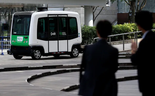 Japan's internet commerce and mobile games provider DeNA Co's Robot Shuttle, a driver-less, self driving bus, is seen during its demonstration in Tokyo, Japan July 7, 2016. (Photo by Toru Hanai/Reuters)