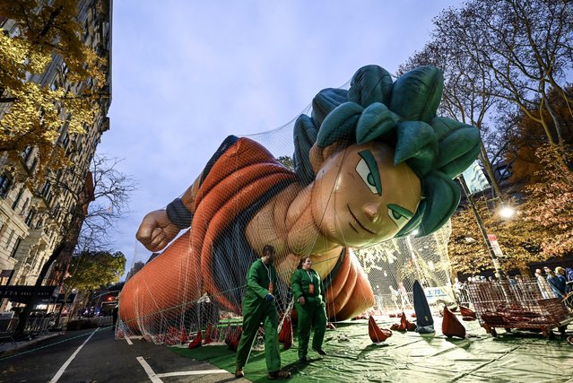 The Macy's inflation team works on giant balloons as they prepare ahead of the 97th Macy's Thanksgiving Day Parade in New York City, United States on November 22, 2023. (Photo by Fatih Aktas/Anadolu via Getty Images)