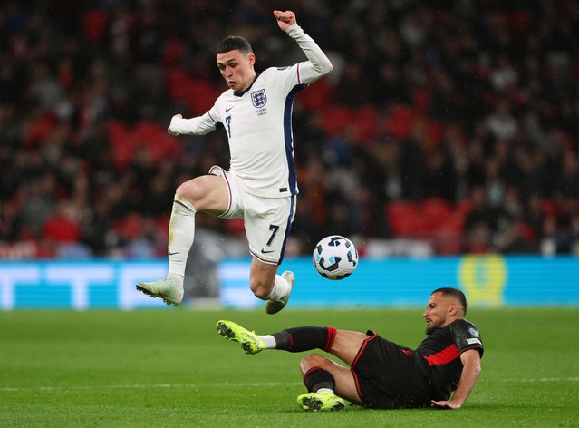 Phil Foden of England in action with Naser Aliji of Albania during the FIFA World Cup 2026 European Qualifier between England and Albania at Wembley Stadium on March 21, 2025 in London, England. (Photo by Marc Atkins/Getty Images)