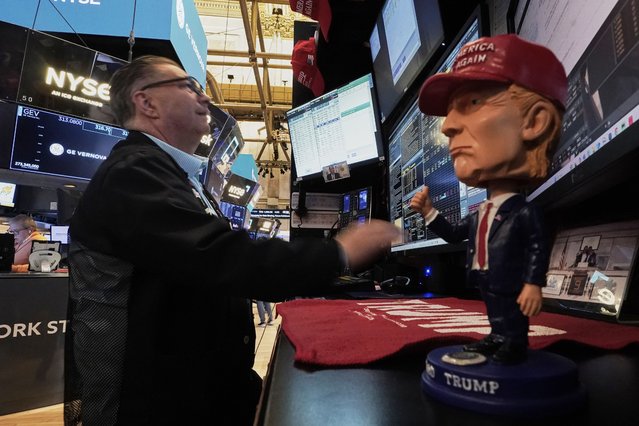 A Donald Trump bobblehead sits on the counter as trader Jonathan Mueller works on the floor of the New York Stock Exchange, Tuesday, April 22, 2025. (Photo by Richard Drew/AP Photo)