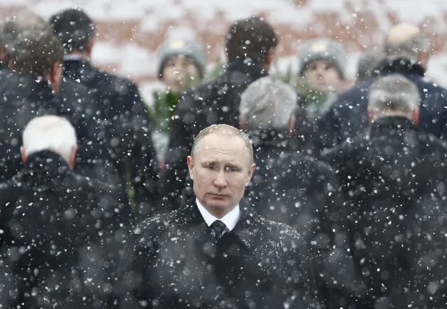 Russian President Vladimir Putin attends a wreath laying ceremony to mark the Defender of the Fatherland Day at the Tomb of the Unknown Soldier by the Kremlin wall in central Moscow, Russia, February 23, 2017. (Photo by Sergei Karpukhin/Reuters)