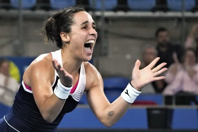 Italy's Martina Trevisan celebrates after defeating Maria Sakkari of Greece in their semifinal match at the United Cup tennis event in Sydney, Australia, Friday, January 6, 2023. (Photo by Mark Baker/AP Photo)