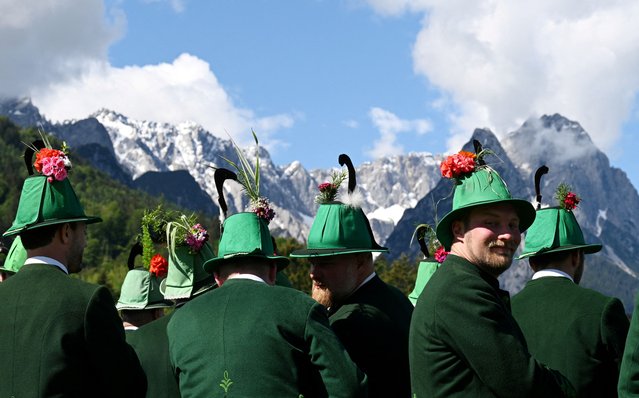 8,500 mountain marksmen meet for the alpine region meeting of shooters from South Tyrol, Tyrol and Bavaria, in Garmisch-Partenkirchen, Germany, on May 26, 2024. (Photo by Angelika Warmuth/Reuters)
