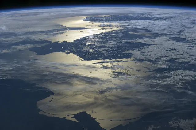 Baltic sea seen from the ISS. Image taken on 15th June 2014. The Baltic Sea (C) is located in Europe. The southern coast of Norway appears at the far top middle, below it is Sweden. Denmark is far left, Poland lower left corner, Russia bottom middle and Lithuania lower right corner on June 15, 2014 at Baltic Sea. (Photo by NASA/SPL/Barcroft Media)