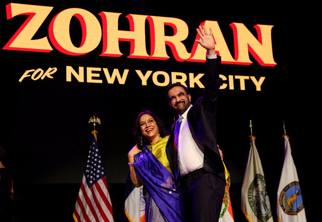 Democratic candidate for New York City mayor Zohran Mamdani waves next to his mother Mira Nair onstage after winning the 2025 New York City Mayoral race, at an election night rally in the Brooklyn borough of New York City, New York, U.S., November 4, 2025. (Photo by Shannon Stapleton/Reuters)