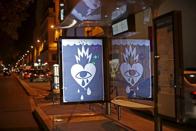 A poster by street artist Ricardo Cavolo as part of the "Brandalism" project is displayed at a bus stop in Paris, France, November 28, 2015, ahead of the United Nations COP21 Climate Change conference in Paris. (Photo by Benoit Tessier/Reuters)