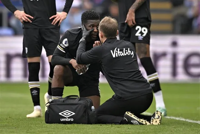 Jefferson Lerma of Bournemouth receives treatment from physio Nick Court following an incident with Joachim Andersen of Crystal Palace during the Premier League match between Crystal Palace and AFC Bournemouth at Selhurst Park on May 13, 2023 in London, England. (Photo by Tony Obrien/Reuters)