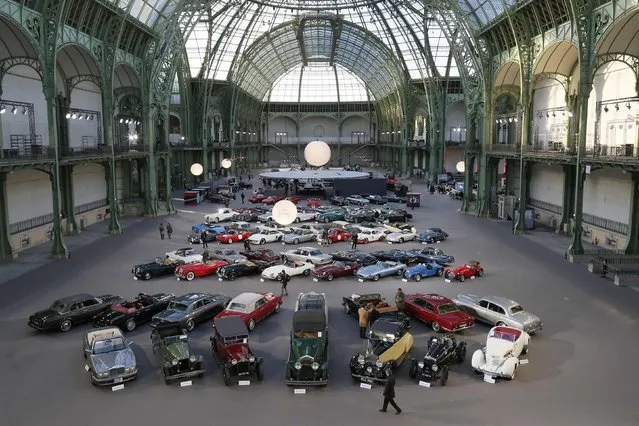 Vintage and classic cars are displayed ahead of the Bonhams' Les Grandes Marques du Monde vintage motor cars and motorcycles auction at the Grand Palais exhibition hall as part of the Retromobile vintage car show in Paris February 4, 2015. (Photo by Gonzalo Fuentes/Reuters)