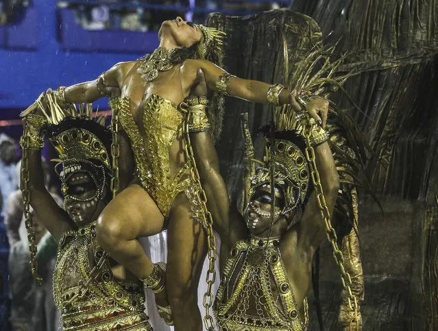 Members of the Samba Unidos do Viradouro perform during the first day of the Special Group parade at the Rio de Janeiro sambodrome, in Rio de Janeiro, Brazil, 15 February 2015. (Photo by Antonio Lacerda/EPA)