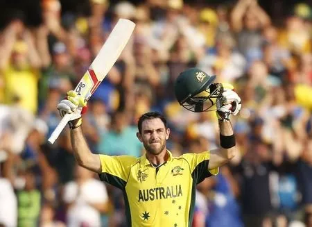 Australia's Glenn Maxwell celebrates reaching his century during their Cricket World Cup match against Sri Lanka in Sydney, March 8, 2015.    REUTERS/Jason Reed 