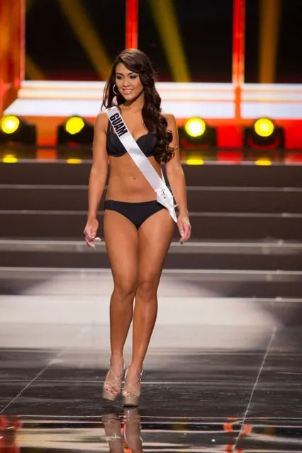 This photo provided by the Miss Universe Organization shows Alixes Scott, Miss Guam 2013, competes in the swimsuit competition during the Preliminary Competition at Crocus City Hall, Moscow, on November 5, 2013. (Photo by Darren Decker/AFP Photo)