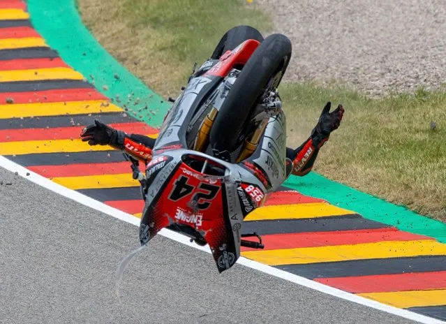 Rider Simone Corsi from Italy of Team Tasca Racing Scuderia Moto2 crash during German Grand Prix at the Sachsenring, Saxony on June 20, 2021. (Photo by Jens Büttner/picture alliance via Getty Images)