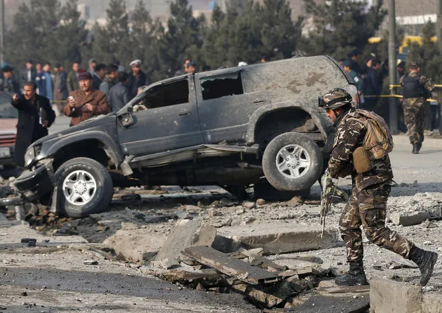 Afghan security forces inspect the site of a blast in Kabul, Afghanistan December 28, 2016. (Photo by Mohammad Ismail/Reuters)