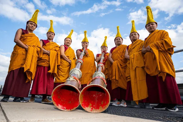 Tibetan Buddhist monks from the Tashi Lhunpo Monastery perform with ceremonial Tantric instruments (long horns) at Kings Place near King's Cross in London on April 25, 2023. ahead of the Songlines Encounters Festival on 24 May. Founded by the first Dalai Lama in 1447 in Shigatse, Central Tibet, Tashi Lhunpo is one of the most important monasteries in the Tibetan Buddhist tradition and now re-established in exile in India. (Photo by Stephen Chung/EMPICS via Alamy Live News)