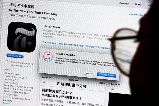 An illustration shows a person looking at a computer screen in Beijing showing an Apple iTunes store message saying that the New York Times app is not available in the Chinese store, in China January 5, 2017. Apple, complying with what it said was a request from Chinese authorities, removed news apps created by The New York Times from its app store in China late last month. The move limits access to one of the few remaining channels for readers in mainland China to read The Times without resorting to special software. The government began blocking The Times’s websites in 2012, after a series of articles on the wealth amassed by the family of Wen Jiabao, who was then prime minister, but it had struggled in recent months to prevent readers from using the Chinese-language app. Apple removed both the English-language and Chinese-language apps from the app store in China on Dec. 23. Apps from other international publications, including The Financial Times and The Wall Street Journal, were still available in the app store. (Photo by Thomas Peter/Reuters)