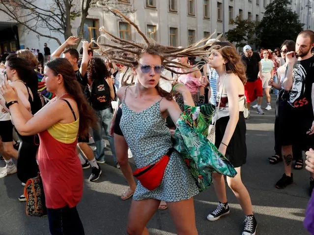 LGBT activists take part in a “Rave Pride” demanding state support for the local LGBTQ outside Ukrainian President's office in Kyiv, Ukraine on July 30, 2021. (Photo by Gleb Garanich/Reuters)