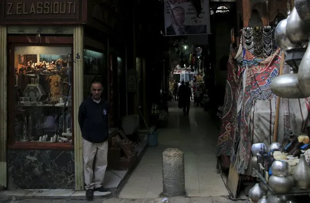 A shopkeeper waits for tourists in the Khan el-Khalili market, at al-Hussein and Al-Azhar districts in old Islamic Cairo, Egypt, November 12, 2015. (Photo by Amr Abdallah Dalsh/Reuters)