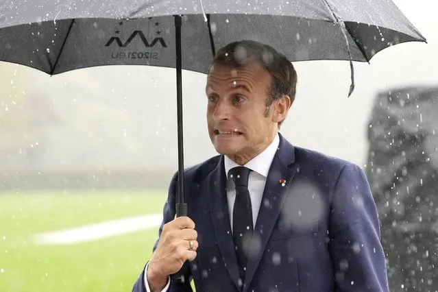 French President Emmanuel Macron arrives for an EU summit at the Brdo Congress Center in Kranj, Slovenia, Wednesday, October 6, 2021. European Union leaders are gathering Wednesday to reassure six countries in the Balkans region that they could join the trading bloc one day if they can meet its standards but are unlikely to give any signal even about when they might advance in their quests. (Photo by Petr David Josek/AP Photo)