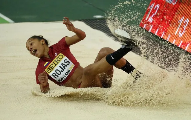 Yulimar Rojas of Venezuela competes on her way to a gold medal finish in the women's triple jump during the IAAF World Indoor Athletics Championships in Portland, Oregon March 19, 2016. (Photo by Lucy Nicholson/Reuters)