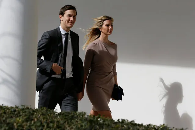 White House Senior Adviser Jared Kushner and his wife Ivanka Trump walk along the colonnade ahead of a joint press conference by Japanese Prime Minister Shinzo Abe and her father, U.S. President Donald Trump, at the White House in Washington, U.S., February 10, 2017. (Photo by Jim Bourg/Reuters)