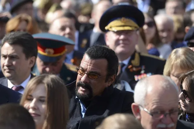 U.S. actor Steven Seagal waits for the Victory Day parade at Red Square in Moscow, Russia, May 9, 2015. (Photo by Reuters/Host Photo Agency/RIA Novosti)