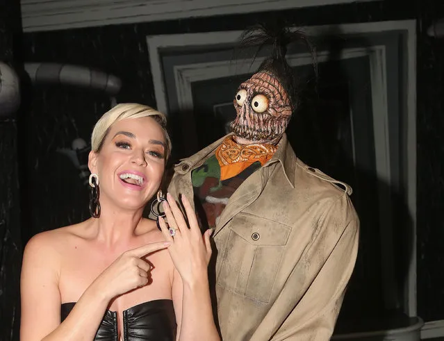 Katy Perry and “Shrunken Head Guy” pose backstage at the hit musical based on the film “Beetlejuice” on Broadway at The Winter Garden Theater on May 7, 2019 in New York City. (Photo by Bruce Glikas/WireImage)