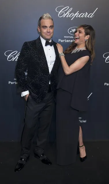Singer Robbie Williams (L) and his wife Ayda Field pose during a photocall ahead of the Chopard Gold Party during the 68th Cannes Film Festival in Cannes, southern France, May 18, 2015. (Photo by Yves Herman/Reuters)