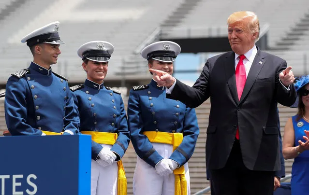 U.S. President Donald Trump gestures at cadets as he participates in graduation ceremonies at the U.S. Air Force Academy commencement in Colorado Springs, Colorado, U.S., May 30, 2019. (Photo by Jonathan Ernst/Reuters)