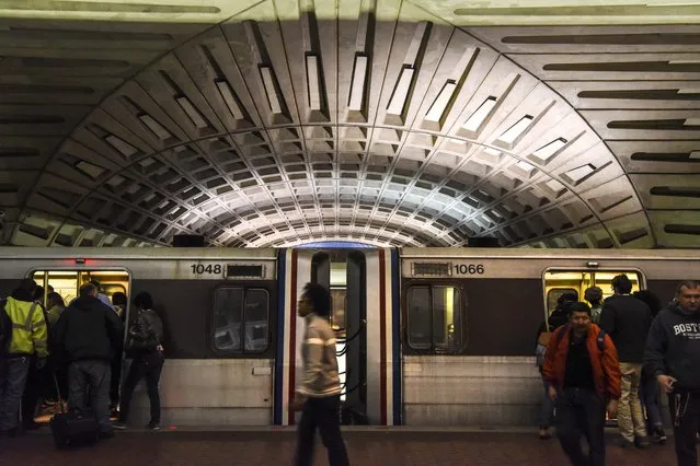 Metro passengers moved through the Metro Center station on March 30, 2016 in Washington DC. Metro's top officials warned that the transit system is in such need of repair that they might shut down entire rail lines for as long as six months for maintenance. (Photo by Michael Robinson Chavez/The Washington Post)
