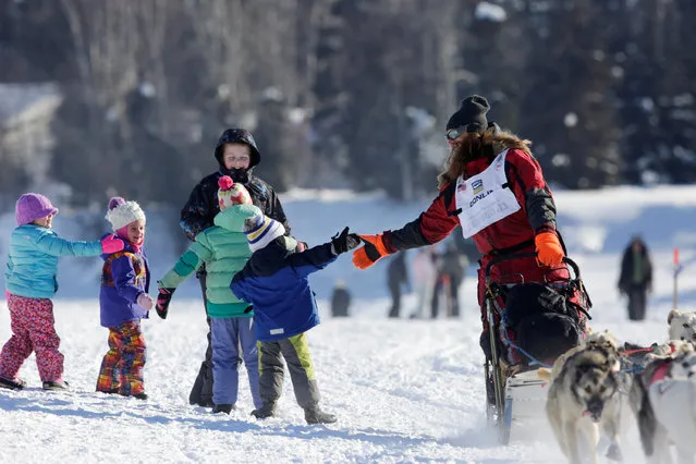 Trent Herbst competes in the official restart of the Iditarod, a nearly 1,000 mile (1,610 km) sled dog race across the Alaskan wilderness, in Fairbanks, Alaska, U.S. March 6, 2017. (Photo by Nathaniel Wilder/Reuters)