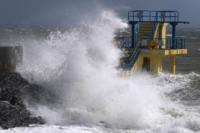Waves crash against Blackrock Diving Board, Salthill, Co. Galway on Saturday, April 6, 2024. Thousands of customers have been left without electricity as Storm Kathleen continues to sweep across the island of Ireland. (Photo by Brian Lawless/PA Images via Getty Images)