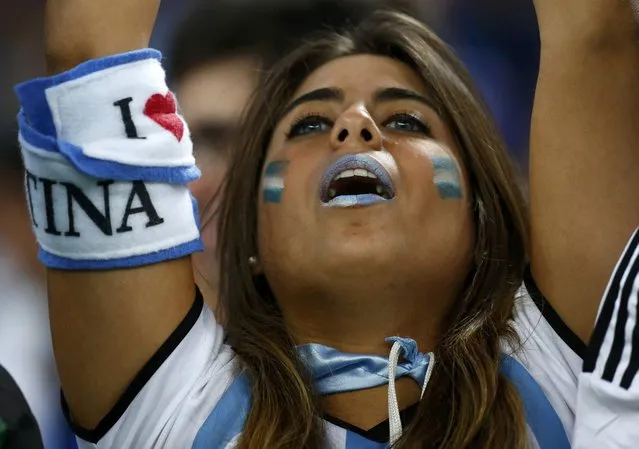 An Argentina supporter waits for the start of the 2014 World Cup Group F soccer match between Argentina and Bosnia and Herzegovina at the Maracana stadium in Rio de Janeiro June 15, 2014. (Photo by Michael Dalder/Reuters)