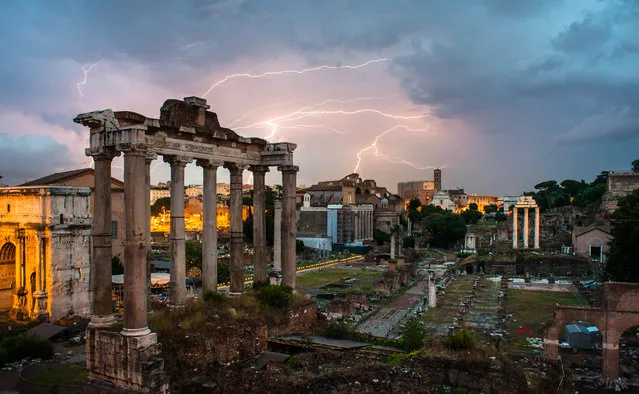 “Sunset with a chance of lightning & thunder”. Instead of letting the menacing weather outlook cast a shadow on my short stay in Rome, I chose to embrace the moment. Photo location: Via della Salaria Vecchia, 5/6, Rome, Italy. (Photo and caption by Bao-Loc-Yvan Tran/National Geographic Photo Contest)