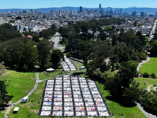 In an aerial view, over 3,000 panels of the AIDS Memorial Quilt are displayed on the lawn at Robin Williams Meadow in Golden Gate Park on June 11, 2022 in San Francisco, California. The National AIDS Memorial is marking the 35th anniversary of the AIDS Memorial Quilt with more than 3,000 panels of the Quilt being displayed in Golden Gate Park. It is the largest display of the Quilt in San Francisco history. The Quilt will be on display on June 11th and 12th. (Photo by Justin Sullivan/Getty Images)