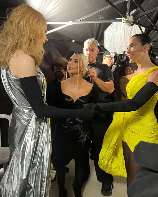 (L-R) American-Australian actress Nicole Kidman, American socialite Kim Kardashian and British singer Dua Lipa pal around at the Balenciaga show in Paris, France in the first decade of July 2022. (Photo by nicolekidman/Instagram)