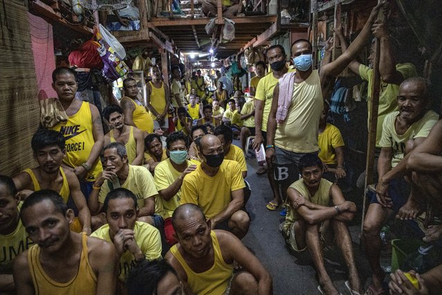 A few inmates are seen wearing face masks to protect against COVID-19 inside Manila City Jail on March 12, 2020 in Manila, Philippines. Concern is growing among inmates as lack of face masks and water supply hit prisons amid the outbreak of COVID-19. The Philippines' Department of Health has so far confirmed 49 cases of the deadly coronavirus in the country, with at least 2 recorded fatalities. The World Health Organization on Wednesday declared COVID-19 as a pandemic. (Photo by Ezra Acayan/Getty Images)