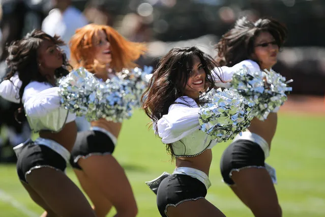 September 15, 2013; Oakland, CA, USA; Oakland Raiders cheerleaders perform during the first quarter against the Jacksonville Jaguars at O.co Coliseum. (Photo by Kelley L. Cox/USA TODAY Sports)