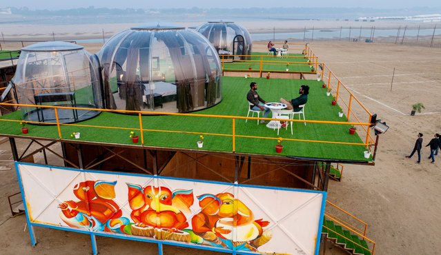 A view of the Dome city luxury cottages for pilgrims during Maha Khumb on the confluence of rivers Ganges and Yamuna where Millions of Hindu pilgrims are going to attend one of the world's largest religious gatherings that lasts 55 days and falls every 12 years in Prayagraj, in the northern Indian state of Uttar Pradesh, India, Friday, December 27, 2024. (Photo by Rajesh Kumar Singh/AP Photo)