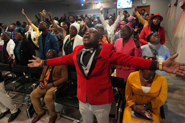 Jean-Michel Gisnel cries out while praying with other congregants at the First Haitian Evangelical Church of Springfield, Sunday, January 26, 2025, in Springfield, Ohio. (Photo by Luis Andres Henao/AP Photo)