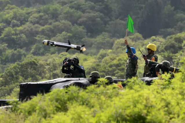 Taiwanese soldiers launch an anti-tank weapon APILAS during the annual Han Kuang exercises in Pingtung county, Southern Taiwan, Thursday, August 25, 2016. (Photo by Chiang Ying-ying/AP Photo)