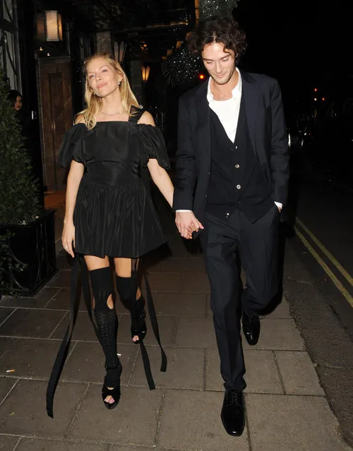 Sienna Miller and actor Oli Green are spotted on a date night at Claridges Hotel in London on November 23, 2022. The 40 year old actress wore a little black dress with matching tights and heels. (Photo by The Image Direct)
