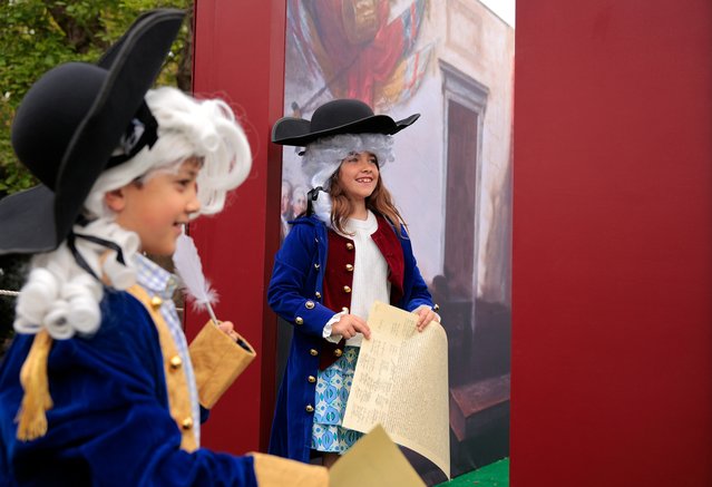 Children dress-up as the "Founding Fathers" during the White House Egg Roll on the South Lawn on April 21, 2025 in Washington, DC. The White House is expecting thousands of children and adults to participate in the annual tradition of rolling colored eggs down the White House lawn, a tradition started by President Rutherford B. Hayes in 1878. (Photo by Chip Somodevilla/Getty Images)