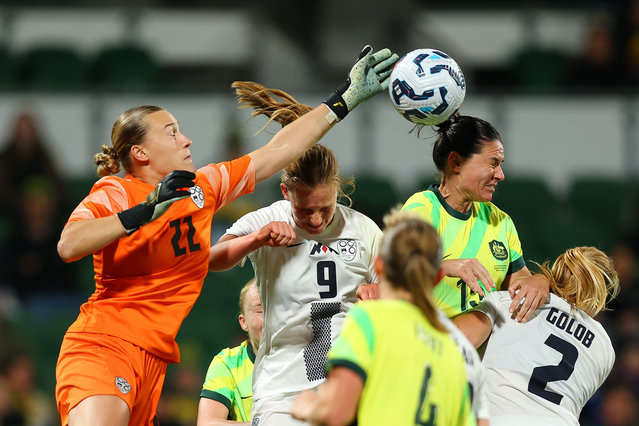 Melania Pasar of Slovenia keeps the ball from teammate Mirjam Kastelec and Emily Gielnik of Australia during the International Friendly match between Australia Matildas and Slovenia at HBF Park on June 29, 2025 in Perth, Australia. (Photo by Paul Kane/Getty Images)