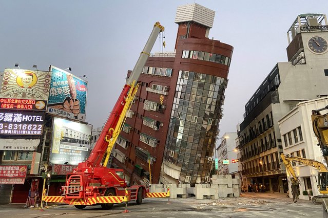 This photo taken by Taiwan's Central News Agency (CNA) on April 3, 2024 shows the damaged Uranus Building in Hualien, after a major earthquake hit Taiwan's east. A major 7.4-magnitude earthquake hit Taiwan's east on the morning of April 3, prompting tsunami warnings for the self-ruled island as well as parts of southern Japan and the Philippines. (Photo by CNA/AFP Photo)