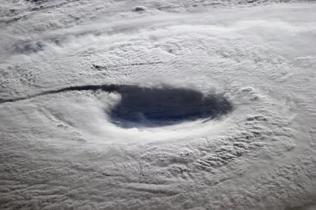 Typhoon Neoguri, a 'super typhoon' with sustained winds averaging about 150 miles per hour taken from the International Space Station (ISS) on July, 7, 2014. (Photo by NASA/SPL/Barcroft Media)